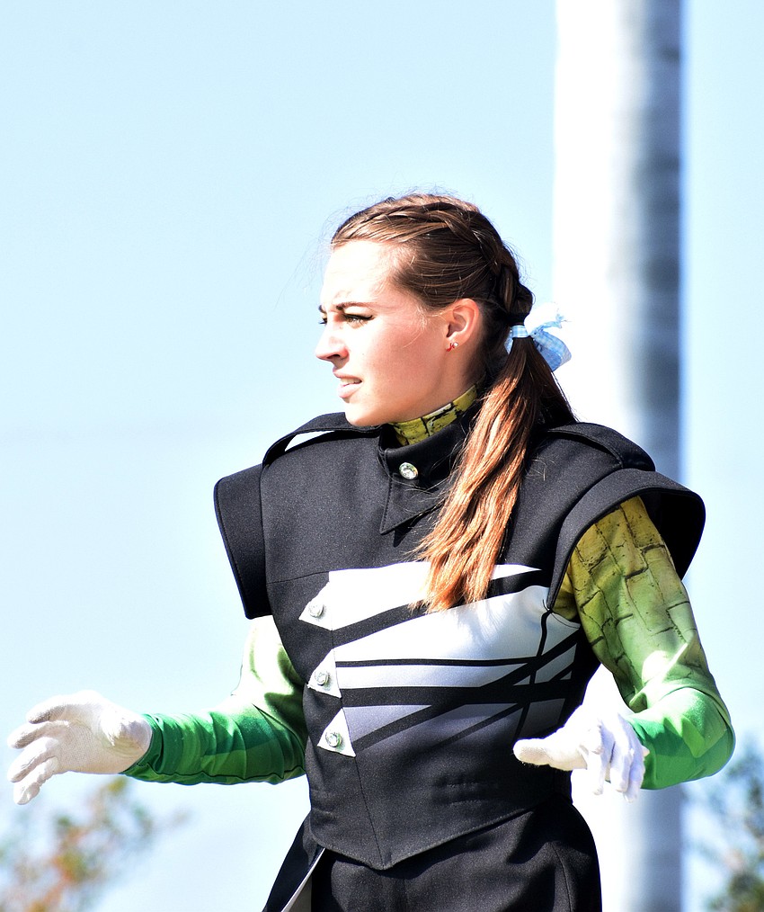 Maya Lander leads the Lakewood Ranch High School Marching Mustangs in its performance. Lander says her final performance was bittersweet.
