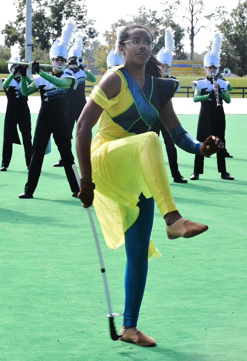 Lakewood Ranch High's Mya Stuart does tricks with a saber.