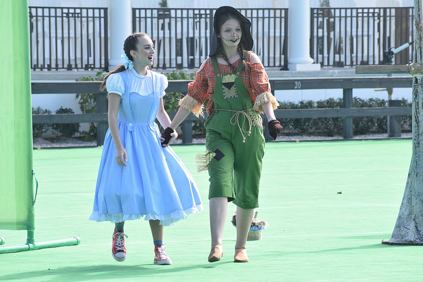 Lakewood Ranch High's Angel Frazzoni and Cayman Corscadden bring Dorothy and the Scarecrow to life.