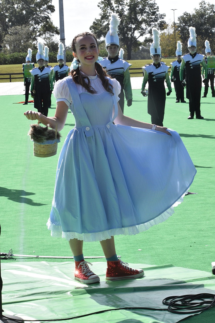Lakewood Ranch High's Angel Frazzoni plays Dorothy for the Marching Mustangs' performance.