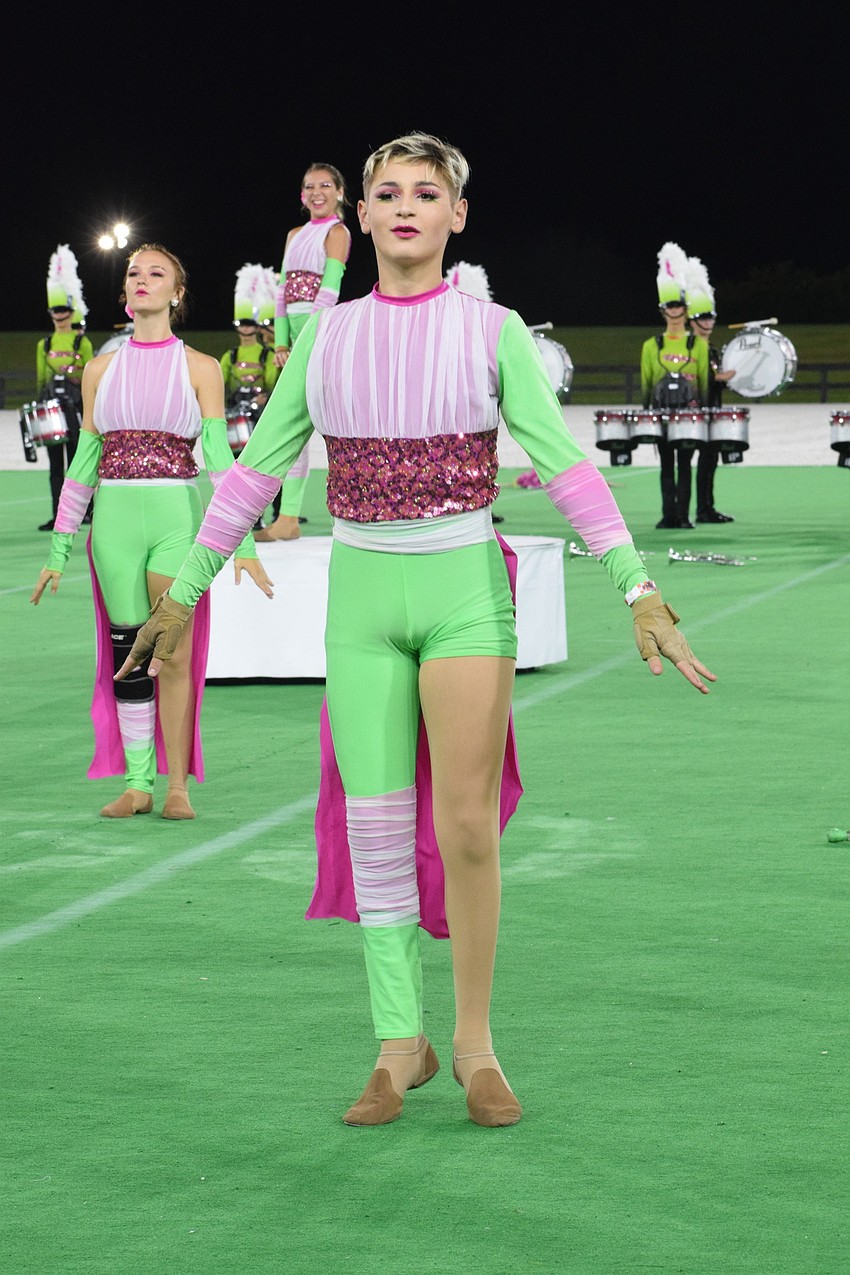 Braden River's Josh Schwab dances with the color guard.