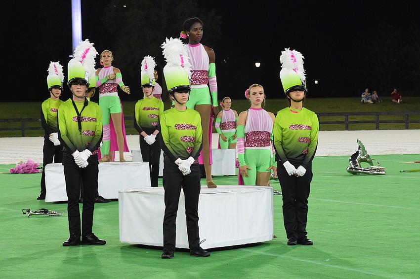 Members of the Marching Band of Pirates are ready to begin their final performance of the season.