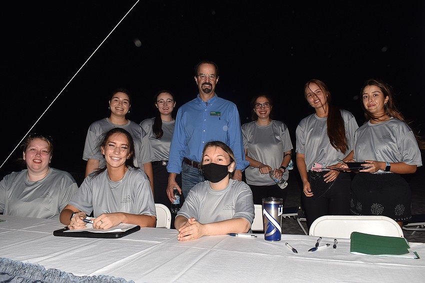 University of South Florida hospitality industry liaison and professor Joe Askren with USF students.
