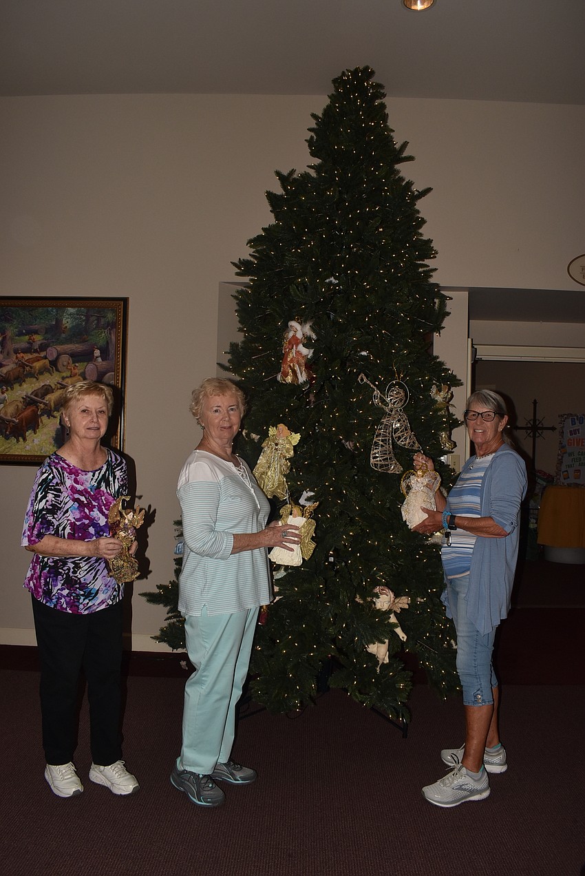 Denise Watermeir, Judy Matthies and Kathy Kussy were in charge of the angel tree.