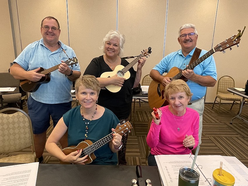 Lakewood Ranch residents Carl Backman, Penny Robinson, Alice Baumann, Clare Barone and Dave Barone used Monday night's jam session to get ready for the holiday season.