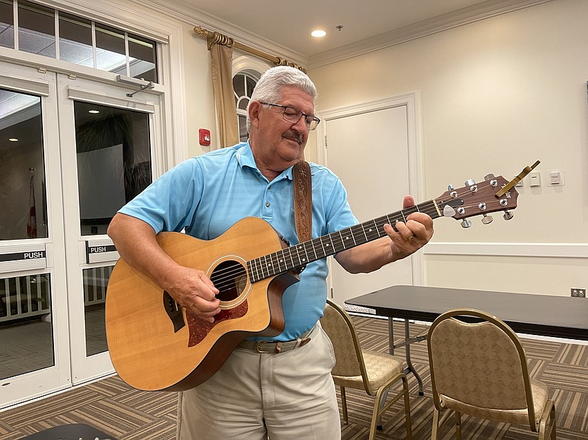 Dave Barone plays a guitar solo during Monday night's jam session at Lakewood Ranch Town Hall.