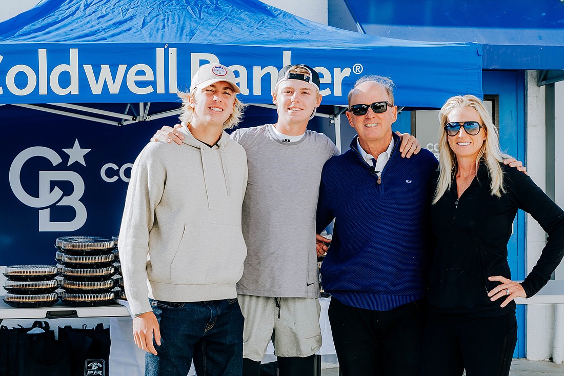 Max, Jake, Roger and Alisa Pettingell. Photo courtesy of Coldwell Banker.