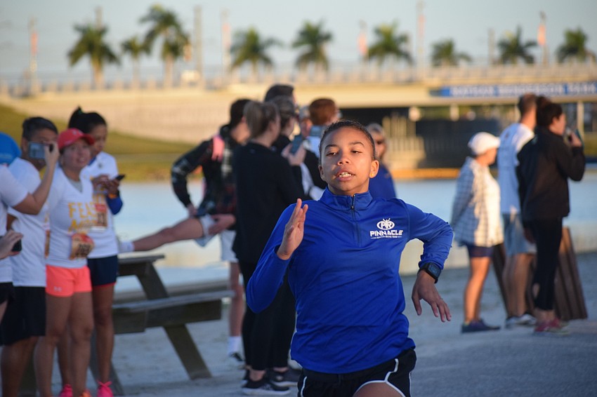 Jasmine France, 12, of Sarasota crushes her age division in the Kids Turkey Dash. She also ran the 5K.