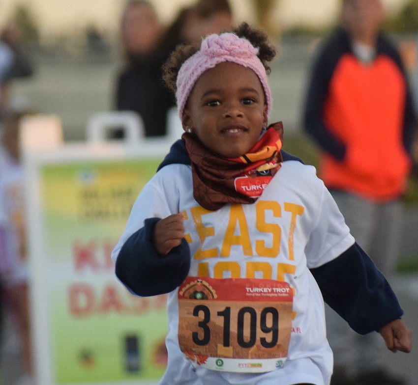 Sarasota's Eden Williams, 3, competes in the Kids Turkey Dash.