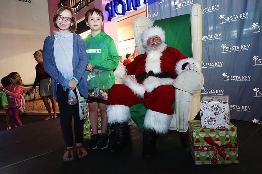 Ryan and Charlotte Day with Santa Claus.
