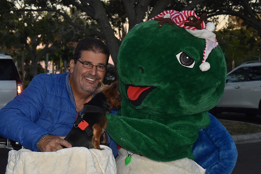 Art Conforti, Reggie Conforti and Shelly the Turtle.