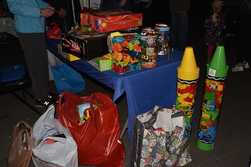 The Rotary Club of Longboat Key collected toys to donate to migrant families.