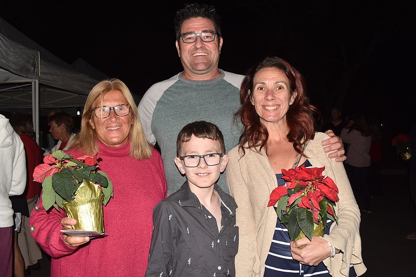 Bonnie Schneider with Dave, Chase and Abi Clabeaux