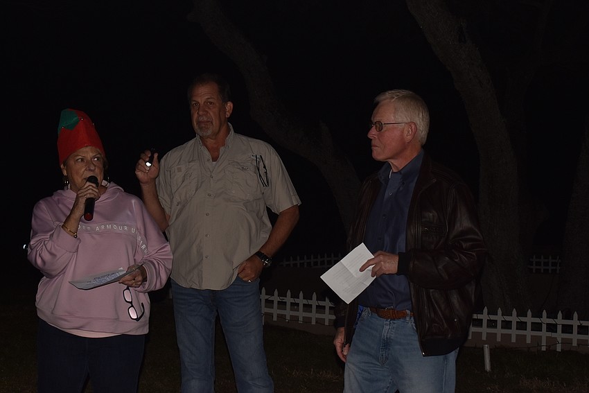 Gail Loefgren, Mark Meador and Mayor Ken Schneier.