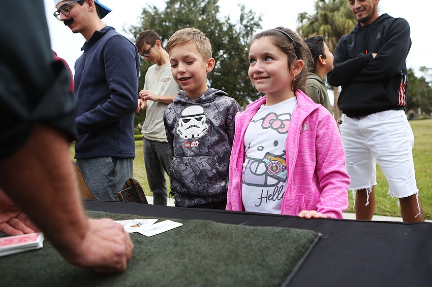 Ryan Amirov and Mia Presman learn magic.