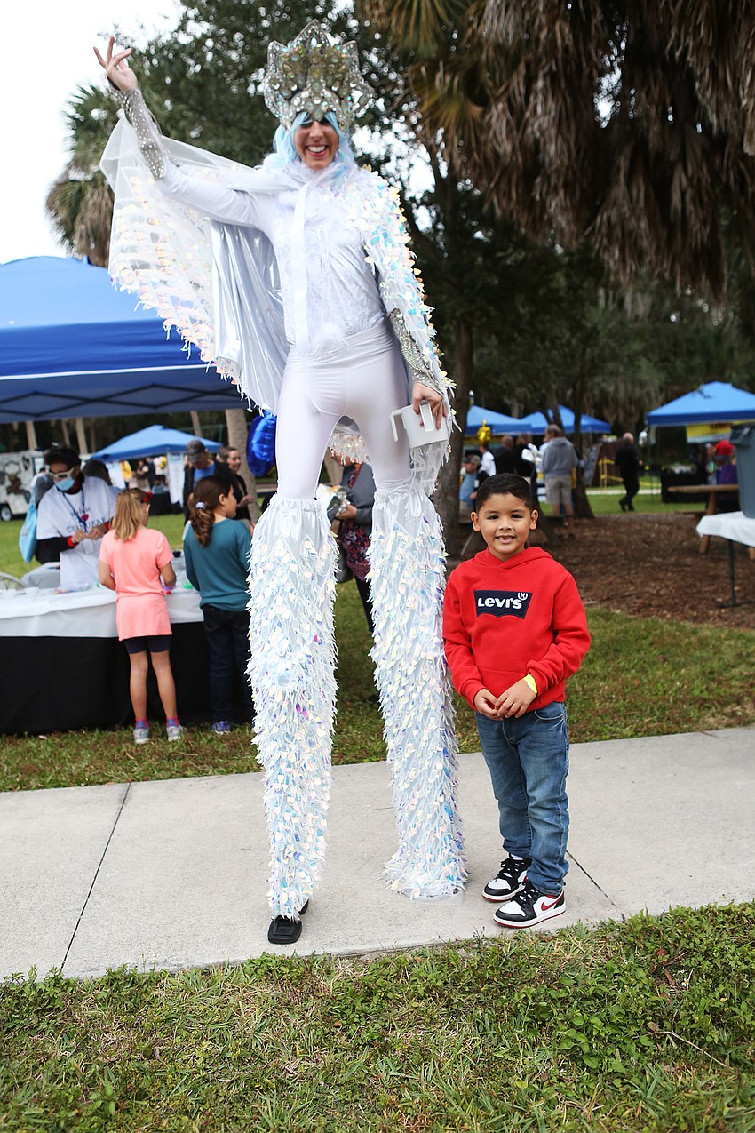 Aaron Santiago stands with Katalina Leonann.