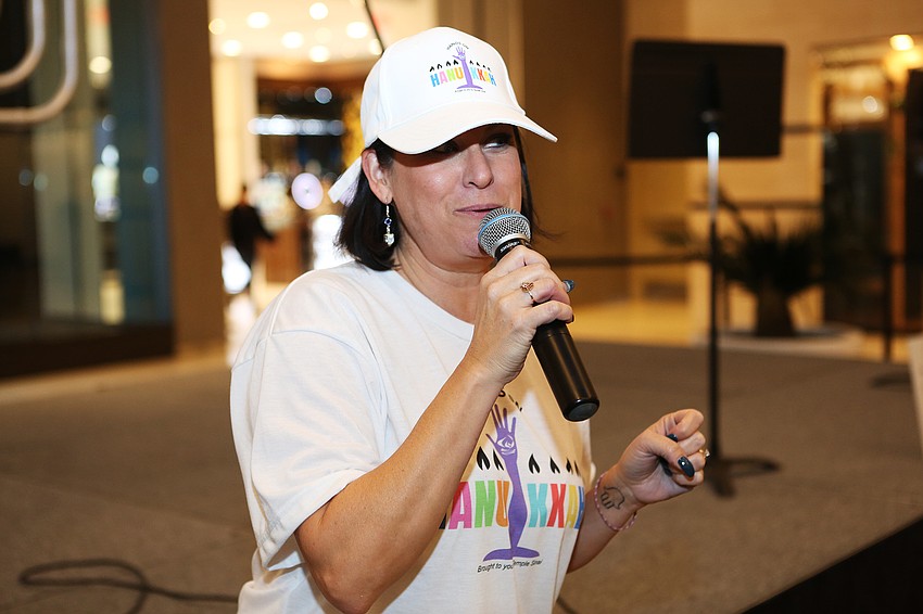 Director of Youth Education, Outreach and Engagement Bethany Leinweber welcomes visitors to the event.