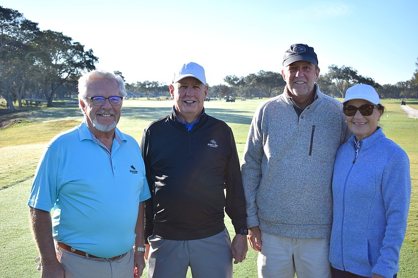 Palm Aire residents Dick Whalen, Geary Richard, John Borys and Nadine Borys begin their first hole of the shotgun tournament that opened the Champions Course.