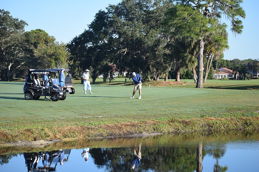 Those who play the renovated Palm Aire Country Club Champions Course will have plenty of challenges, such as pitching over this lake to the 18th green.