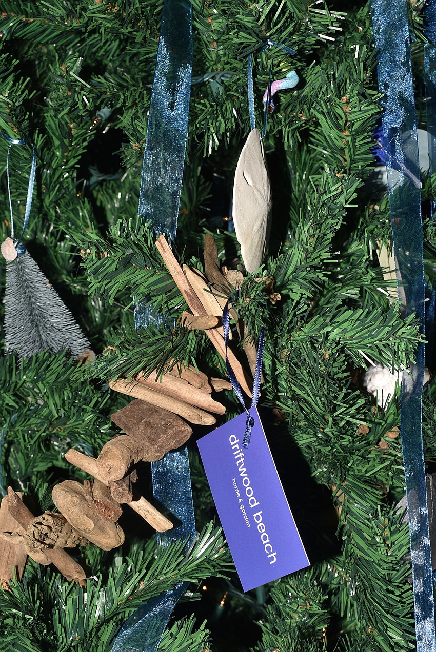 Heather Rippy from Driftwood Beach Home and Garden decorated her tree with driftwood.