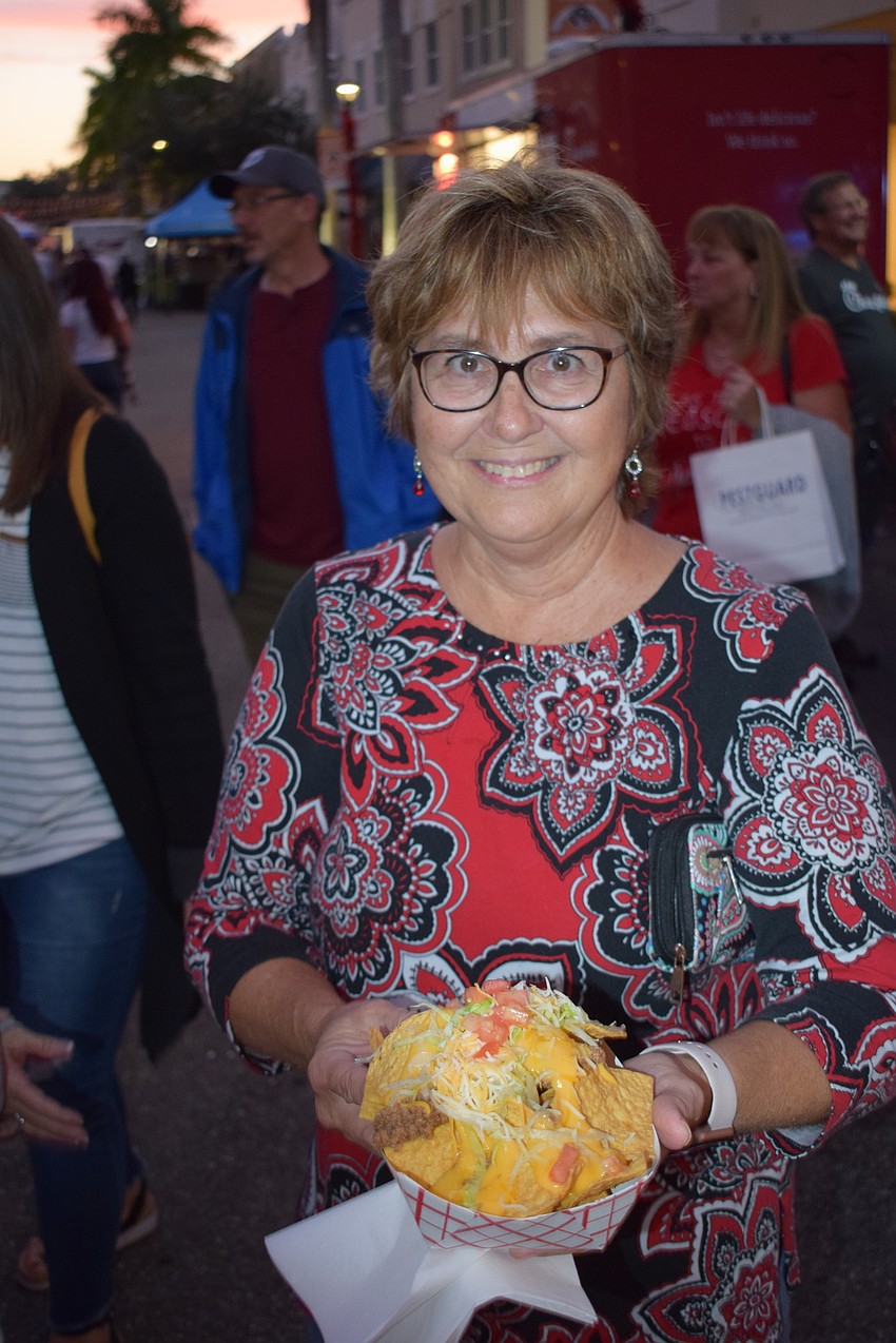 What's a Music on Main without some nachos? Bradenton's Rosanna Martz shows off her order.