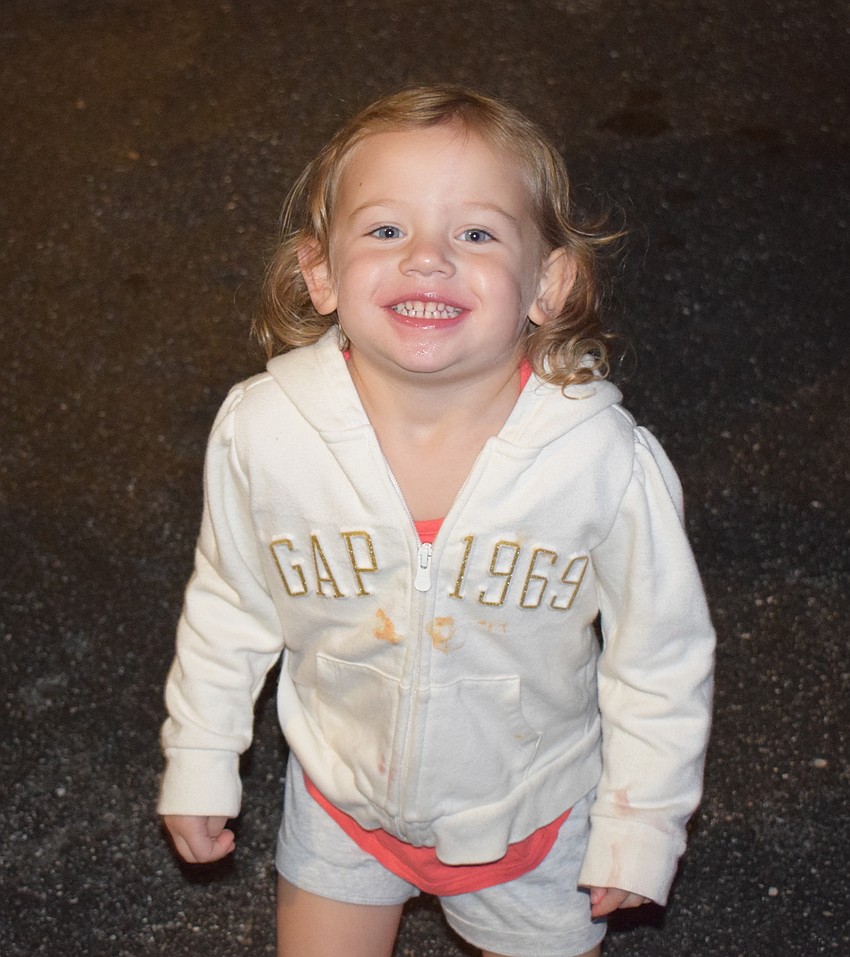 Lakewood Ranch 3-year-old Charley Wood obviously likes dancing to the band Midnight Mama at Music on Main.