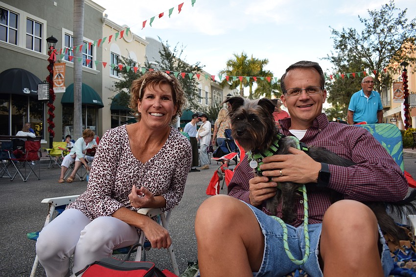 Jackie McLanahan, Kelce, a Cairn Terrier, and Jeff McLanahan of Country Meadows say the music always is great at Music on Main.