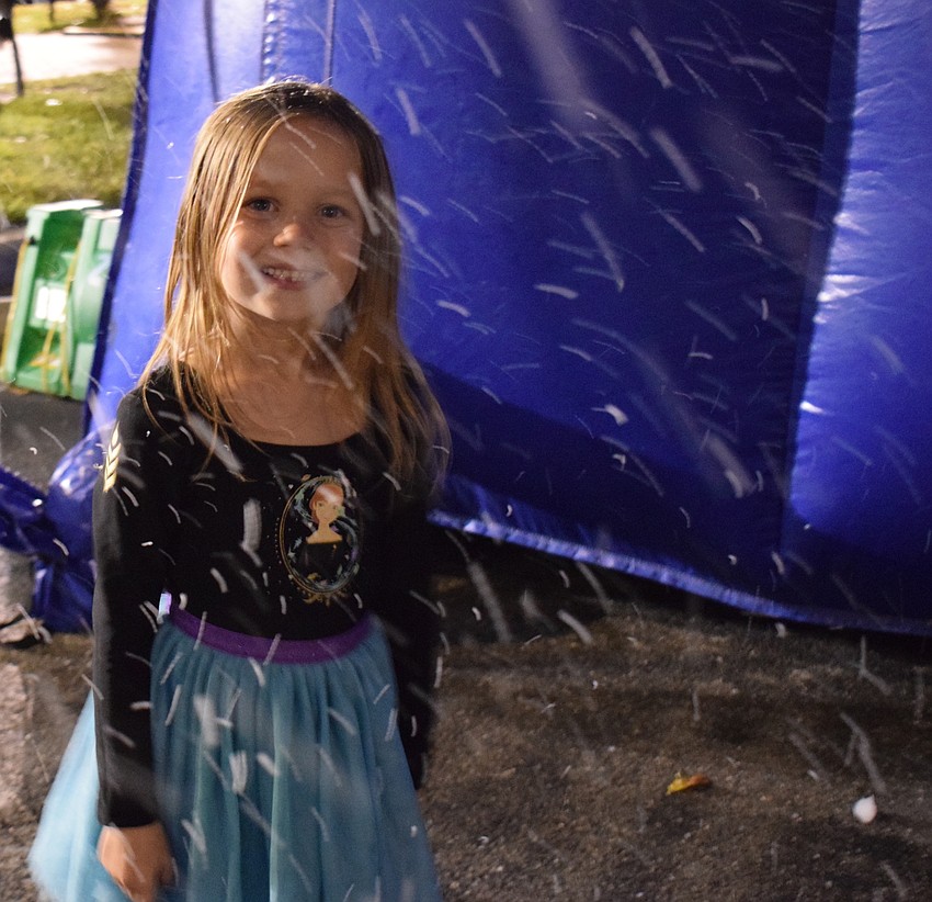 Payton Lamont enjoys a snow shower courtesy of Grace Community Church. Her mom is the new president and CEO of the Lakewood Ranch Business Alliance, Brittany Lamont.