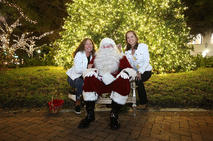 Susan Bonomi and Irene Tuttle with Santa