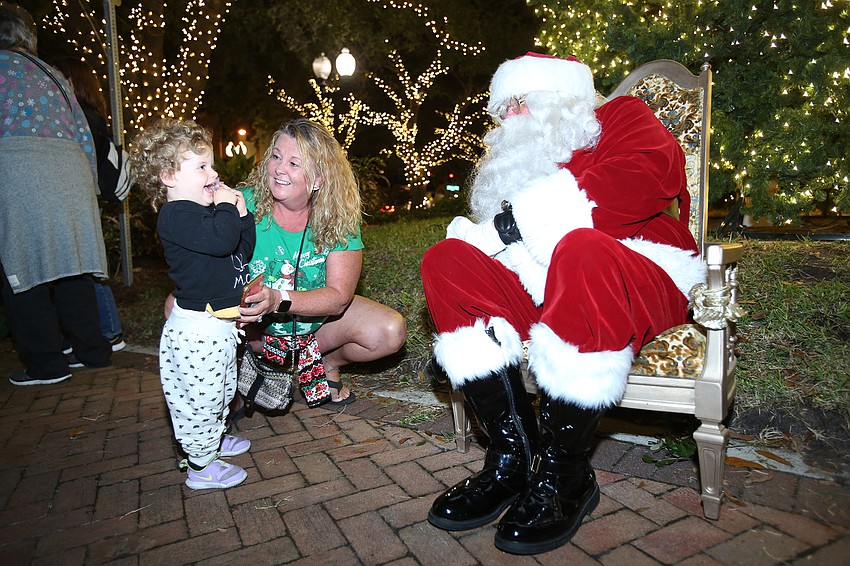 Gayla McLeod is introduced to Santa.