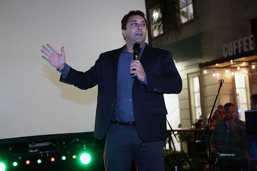 City commissioner Hagen Brody welcomes attendees.