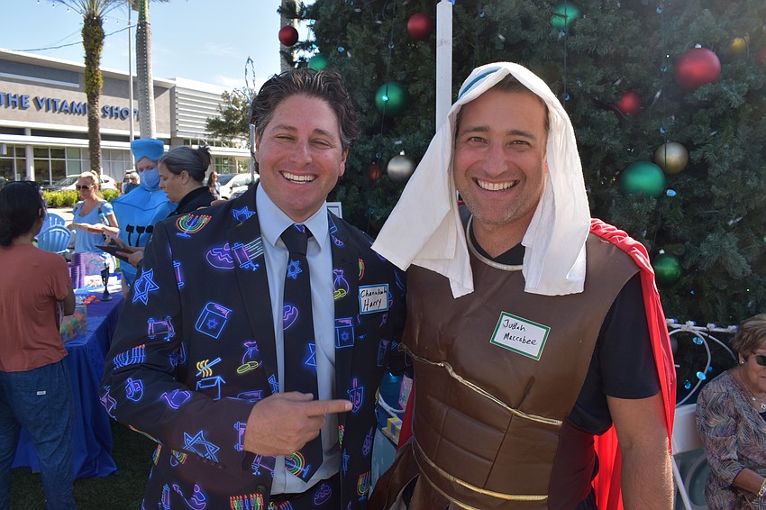 Hanukkah Harry (Ryan Ackerman) and Judah Maccabee (Robert Stroud) drew a crowd everywhere they went during the celebration.