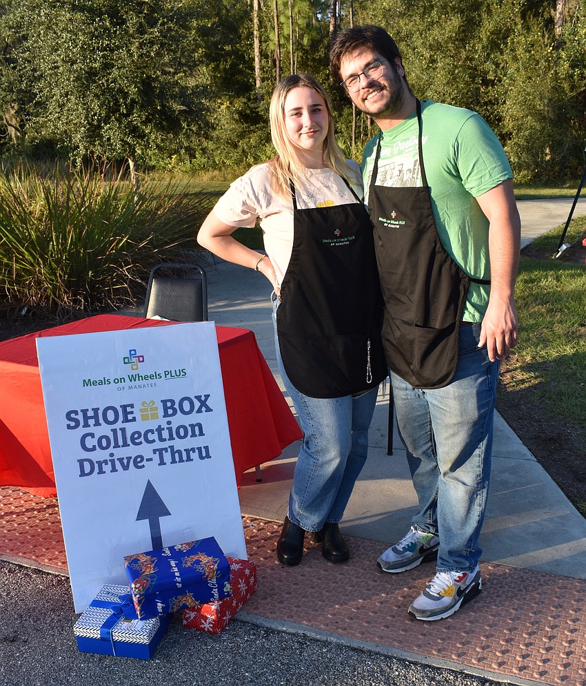 Kaylee Grobler and Jackson Aquino were taking care of the shoebox donation drive-thru at the reception.