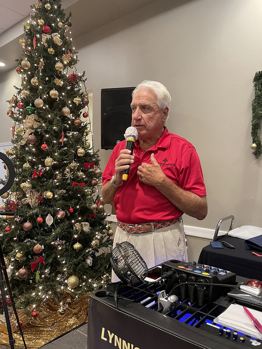 Meals on Wheels Plus Manatee Board Chairman Mark Goodson thanks those who donated shoeboxes during a reception at the Lakewood Ranch Elks Dec. 4