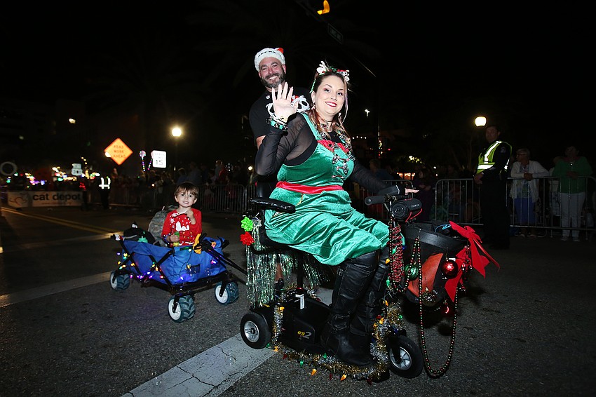 Kashtion, Holly and David Mawer with the Girl Scouts