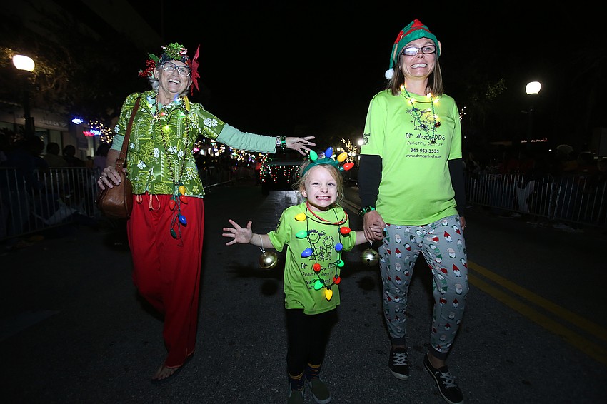 Elizabeth Noback, Emily McBride and Jenyel Hackney walk with Sarasota Softball.
