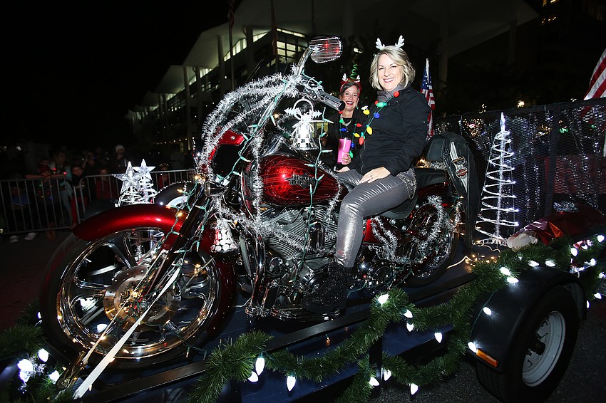 Cherri Kessler rides a motorcyle with Thunder By The Bay