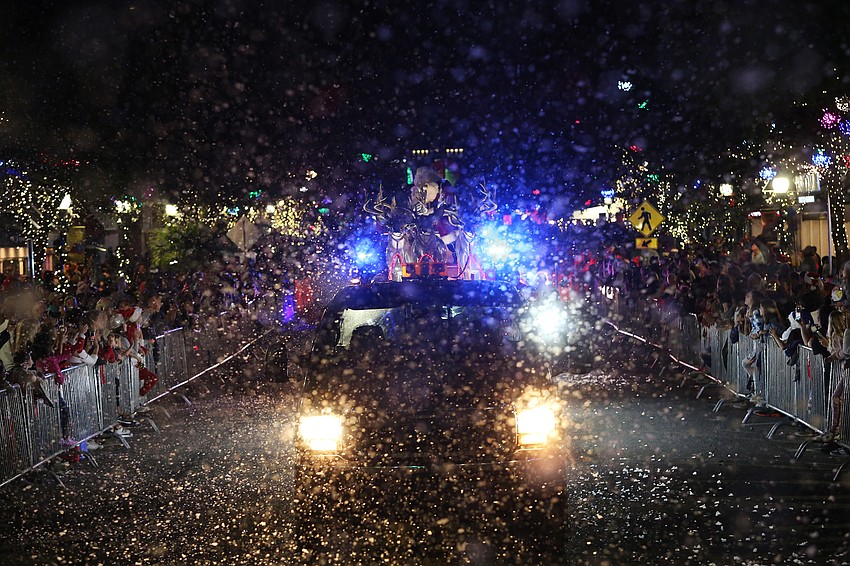 The parade was full of snow and cheering families.