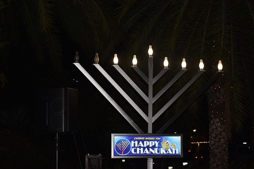 As the sixth night of Hanukkah fell, the corresponding candle on the menorah was lit.