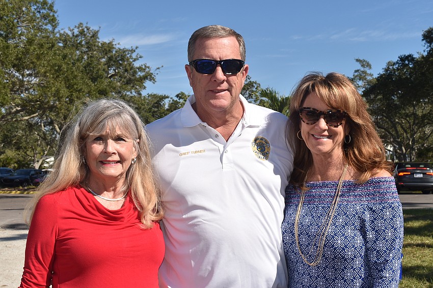 Lynn Larson, interim police chief George Turner and Lori Rice