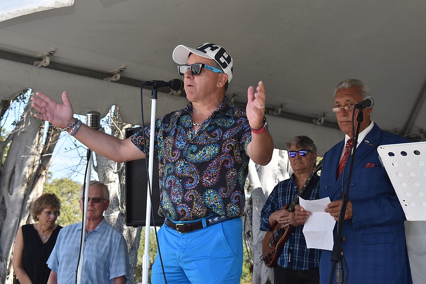 Platinum sponsor and Unicorp National Development President Chuck Whittall kicks off the raffle drawings.