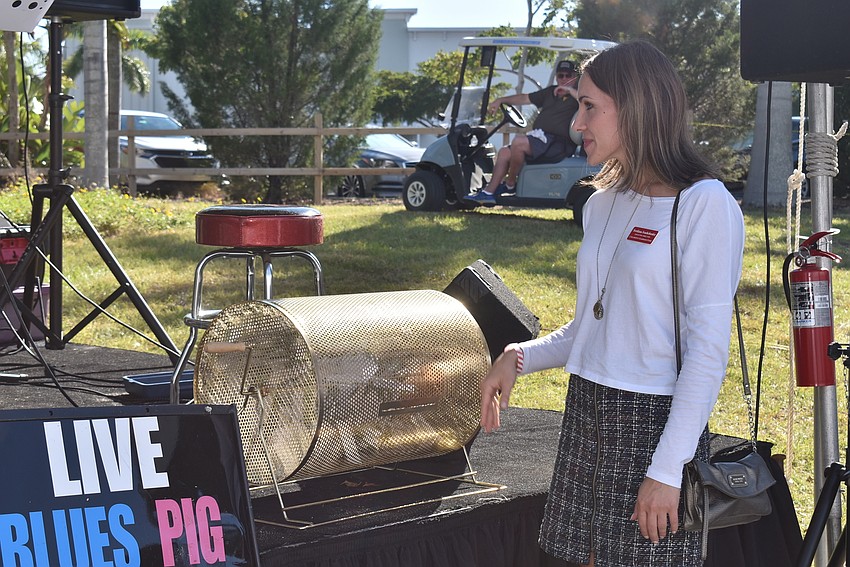 Svetlana Ivashchenko draws a raffle winners.
