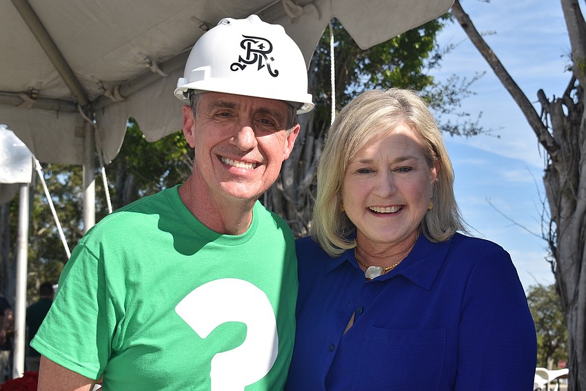 Kiwanis President Michael Garey and grand prize winner Monica Verinder