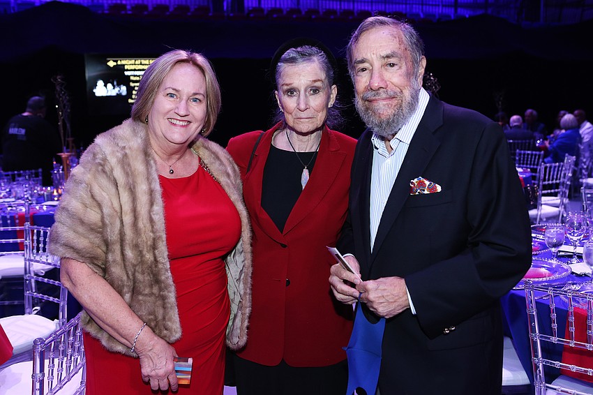 Executive Director Julie Leach with Judith and Andrew Economos