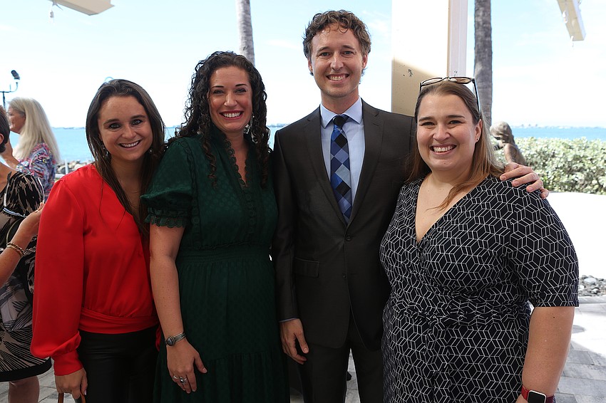 Skye Mata, Elli Baldwin, board chairman Brad Bryan and Christy Bray