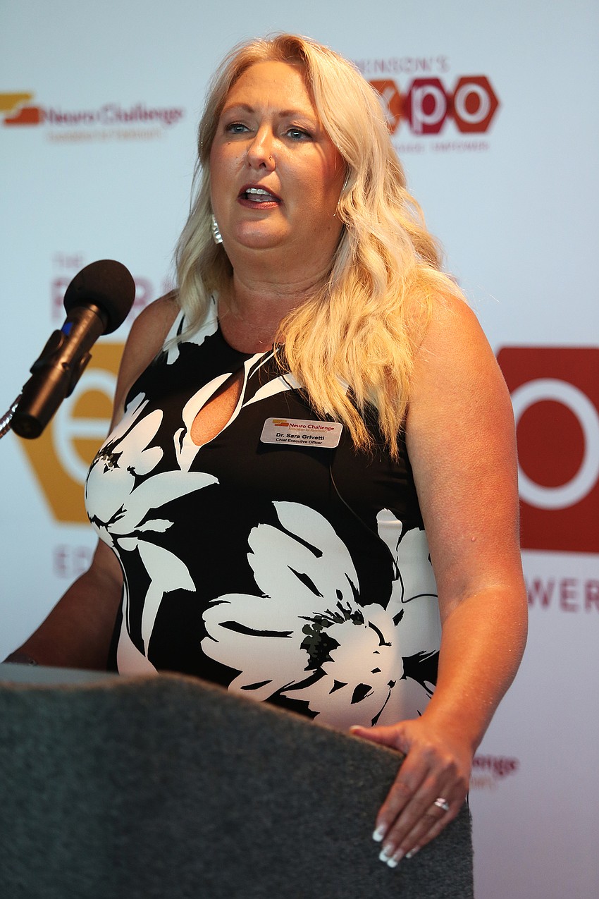 CEO Dr. Sara Grivetti welcomes the audience.