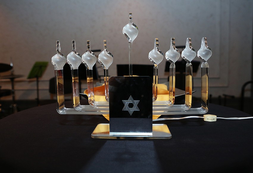 The night included a lighting of the menorah for Hanukkah