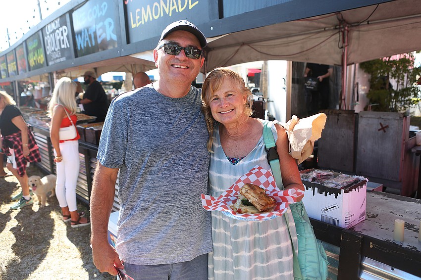 Don and Rhonda Miller eat mahi mahi.