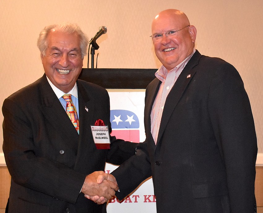 FEBRUARY: Joe McElmeel and Scott Gray at the changing of leadership of the Longboat Key Republican Club.