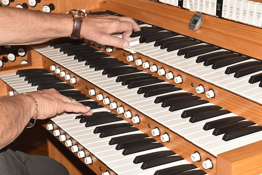 MAY:  Dale Hooey plays multiple sets of keys.